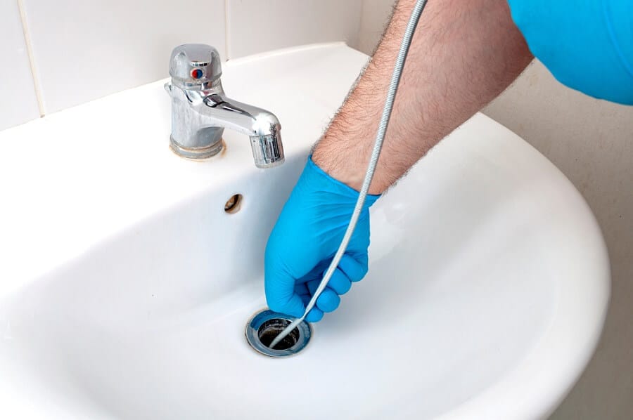 signs of blocked drains and pipes